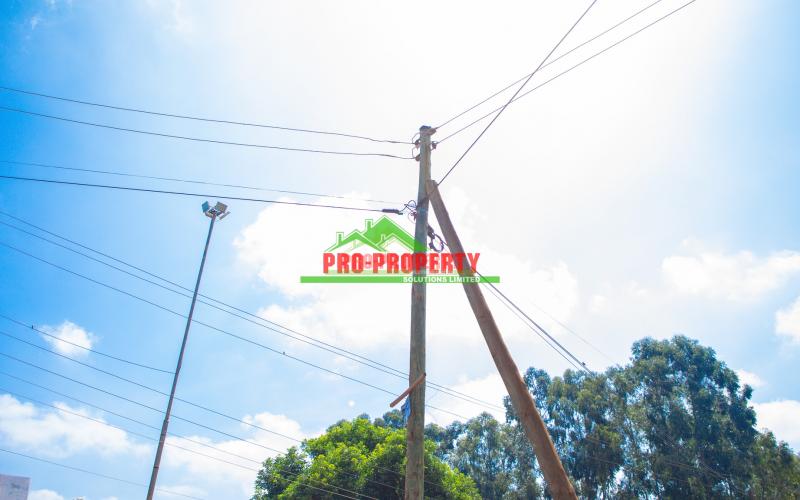 🏢 Prime 100x100ft Commercial Plot Touching Tarmac For Sale In Gikambura, Kikuyu – Ideal For Mixed-use Investment!