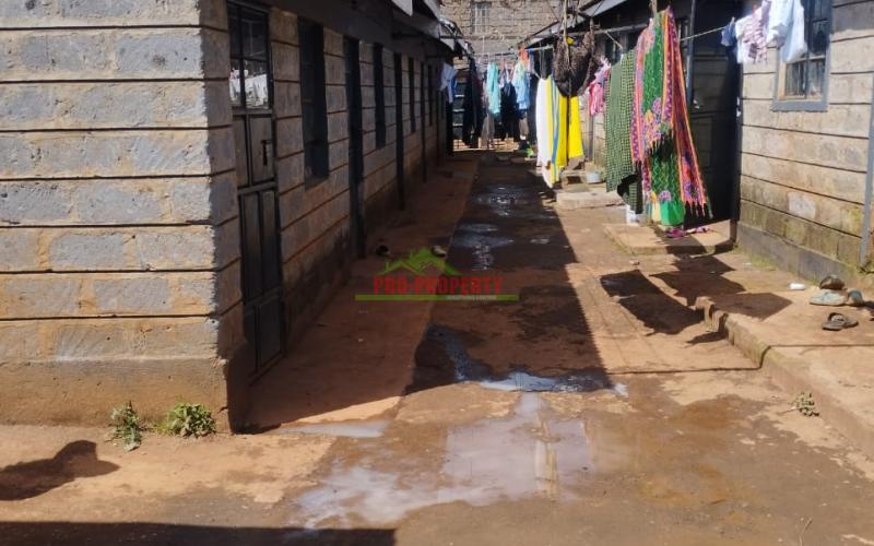 Prime residential/commercial 50*100ft plot for sale with a rental income